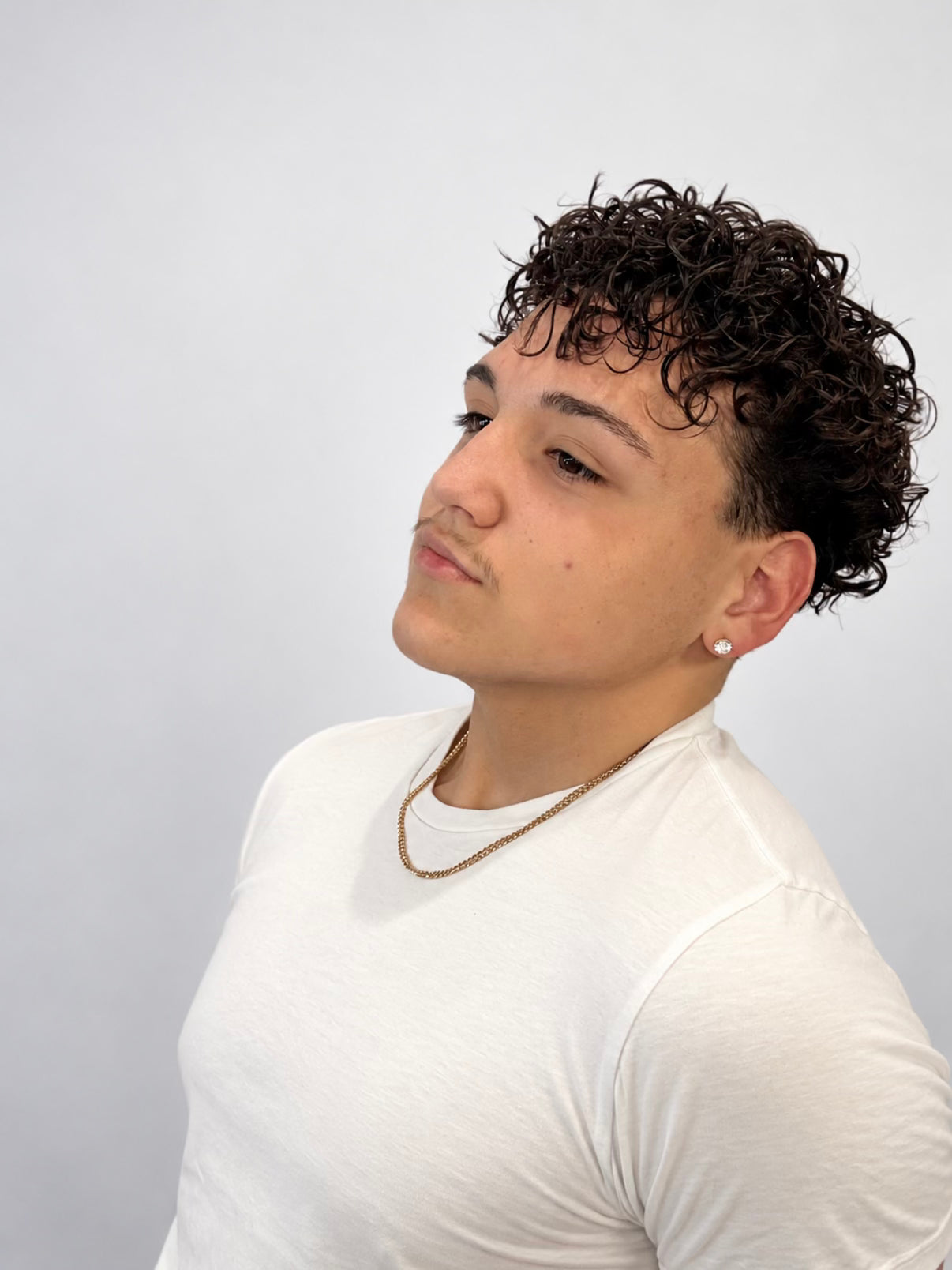 Joshua Marcello in a white shirt